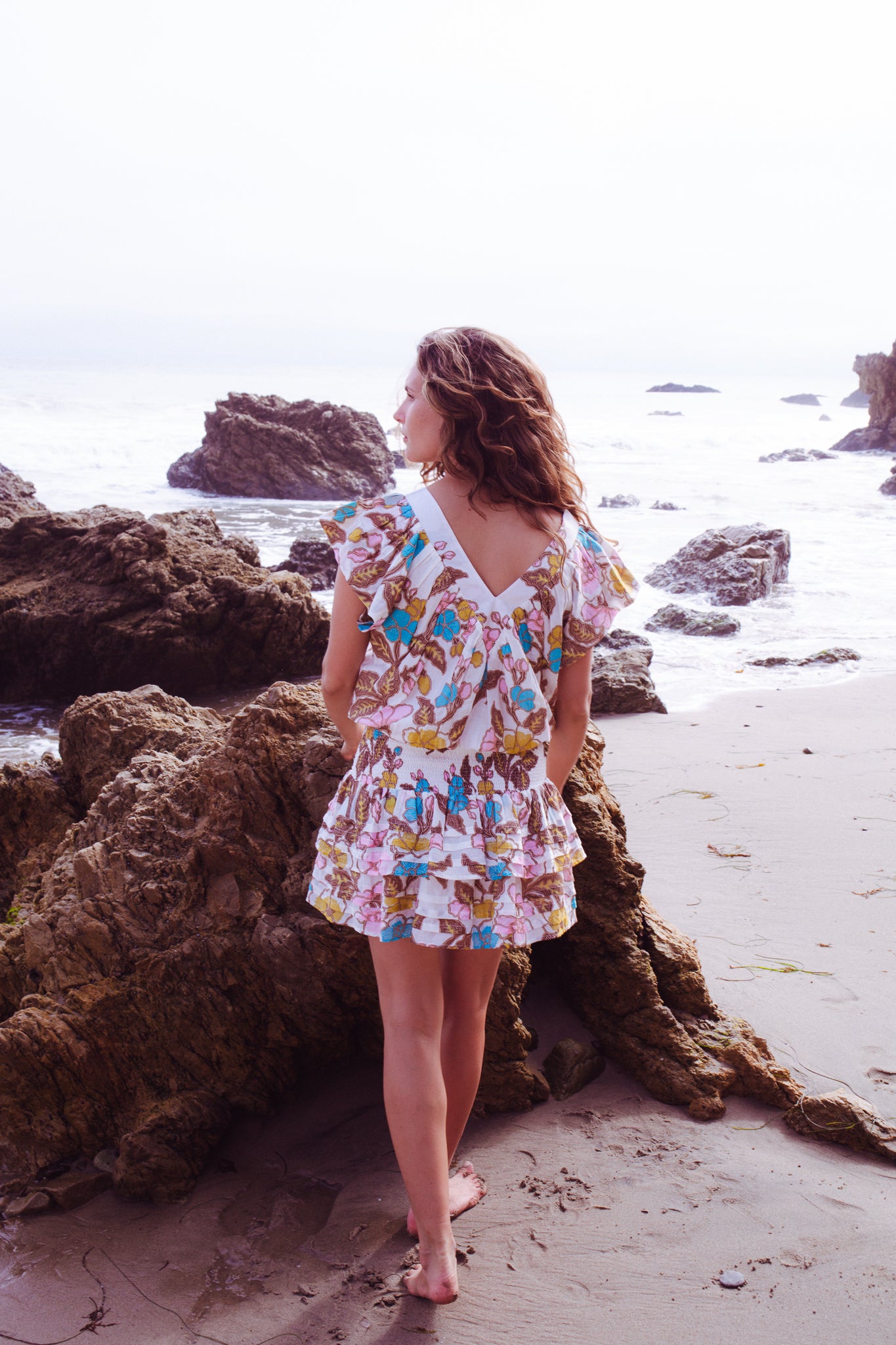 PLEATED SMOCKED MINI SKIRT IN TURQ YELLOW FLORAL