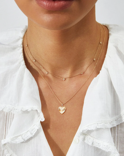 GOLD AND DIAMOND FLUTED HEART NECKLACE IN 14K YELLOW GOLD