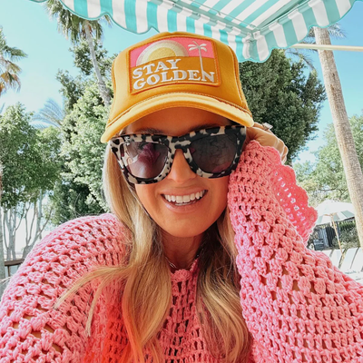 STAY GOLDEN PATCH TRUCKER HAT IN GOLD