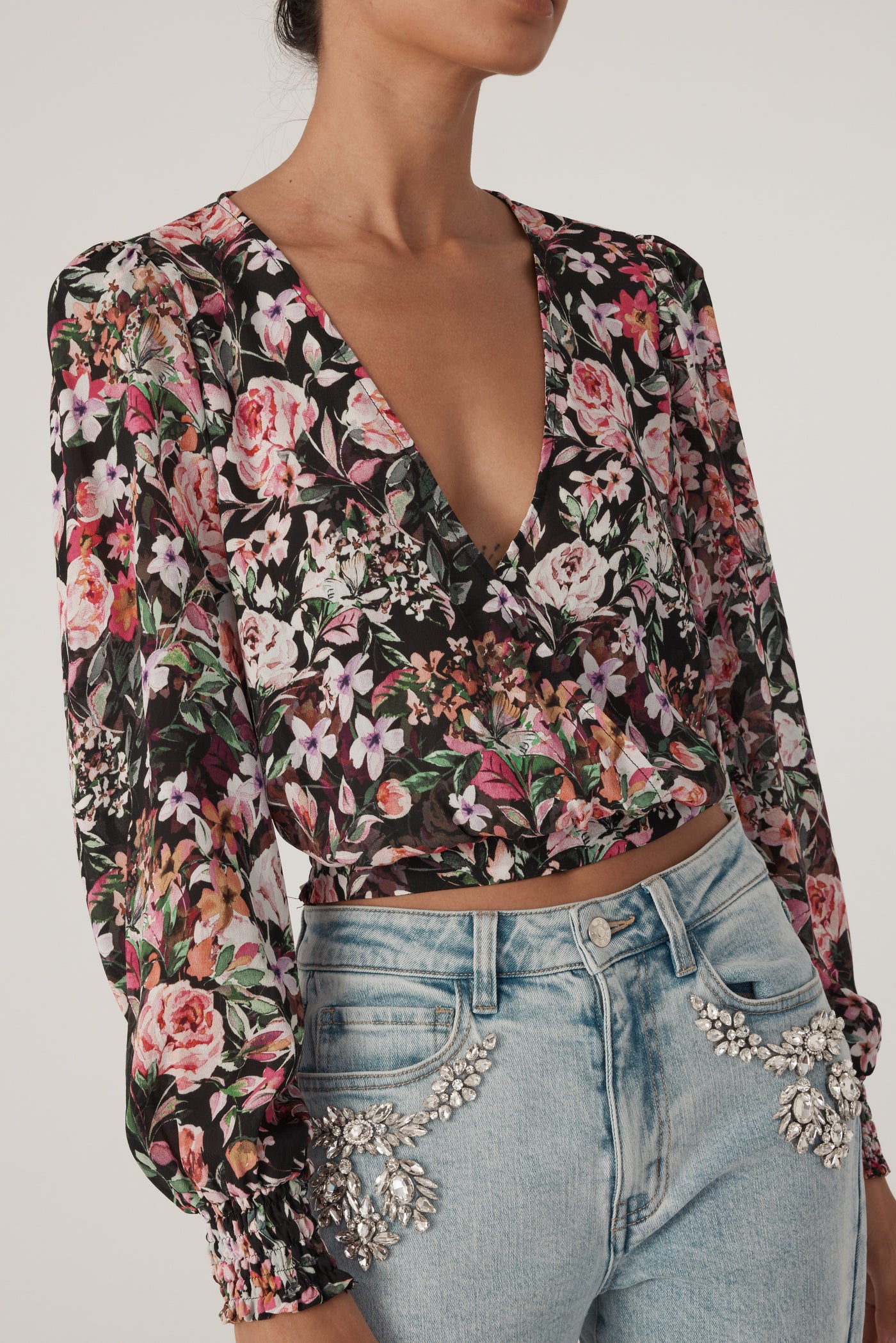 AVANNA FLORAL WRAP BLOUSE IN ZESTY FLORAL BLACK PINK